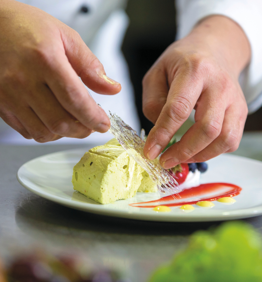 Chef plating up food
