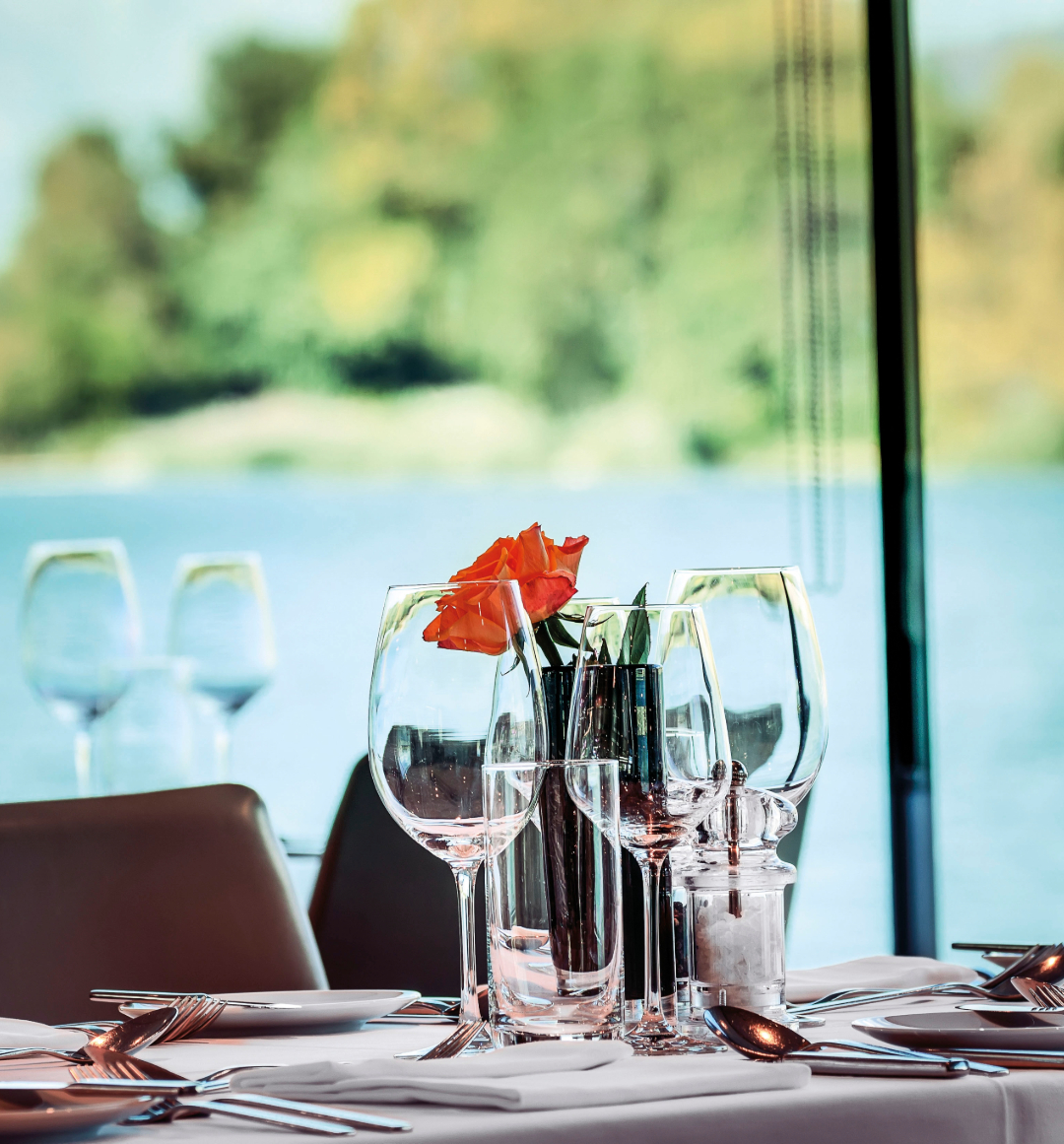 Dinner place settings aboard Emerald river cruise