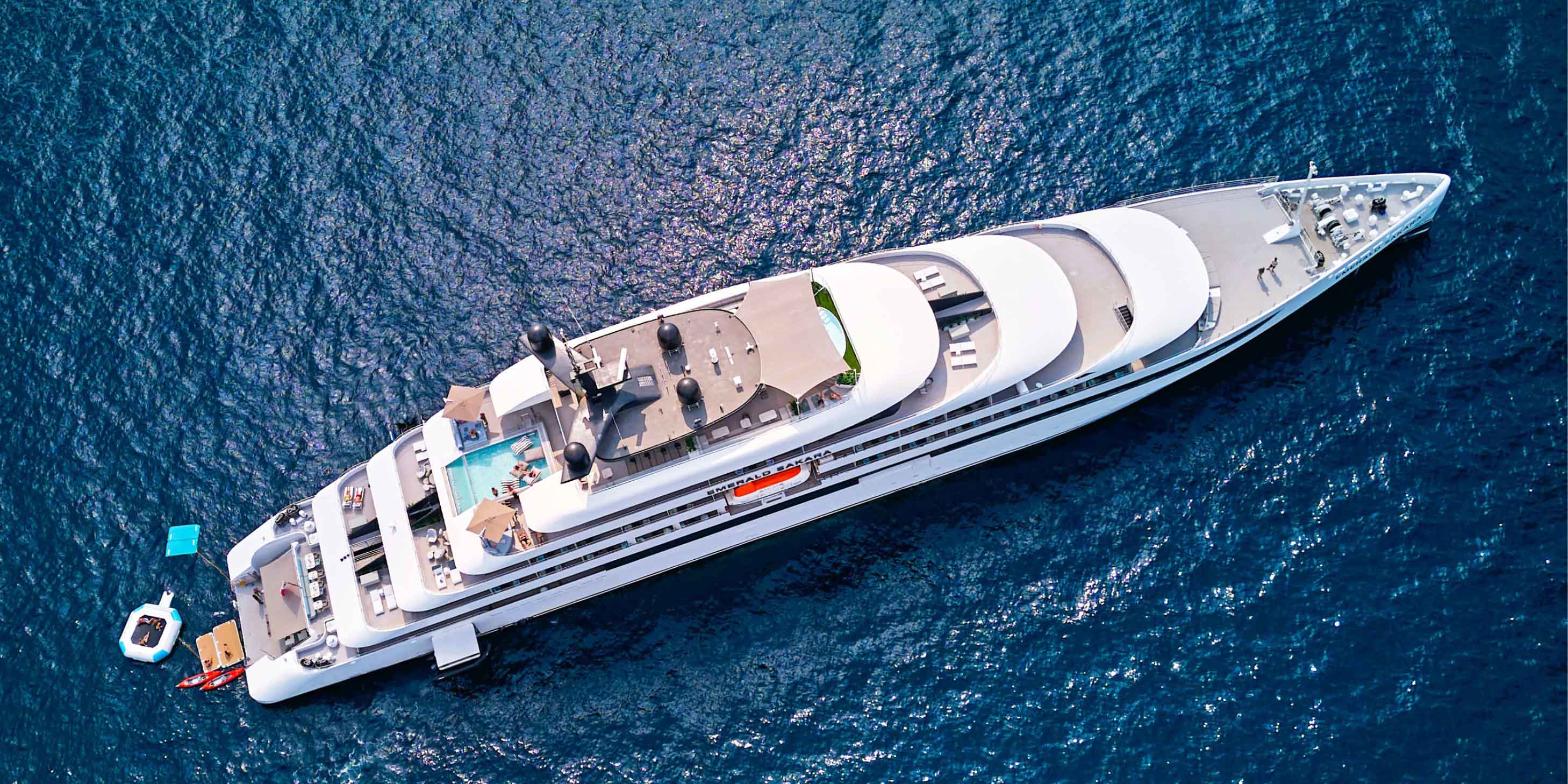 Man swimming in the pool on board a luxury yacht