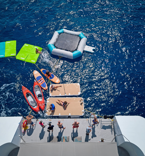An arial view of the Emerald Sakara marina platform equipped with kayaks and inflatables. 