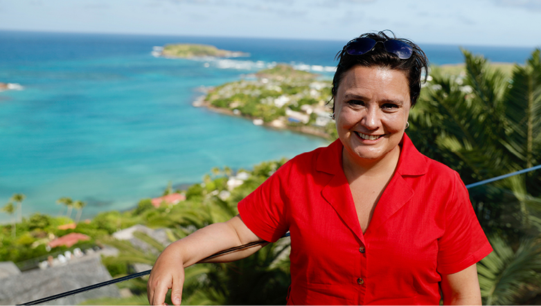 Susan Calman with a view of the Caribbean behind her