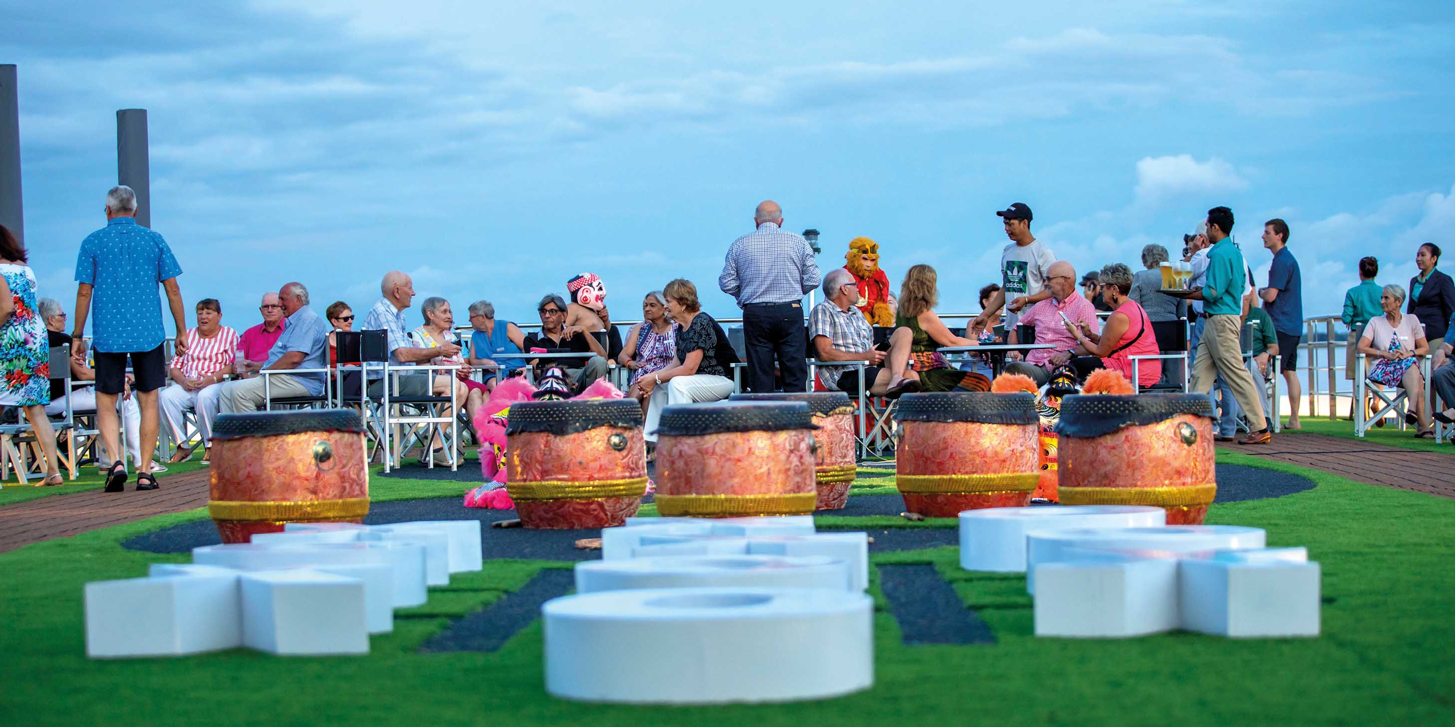 Group of people on the top deck of a river cruise 