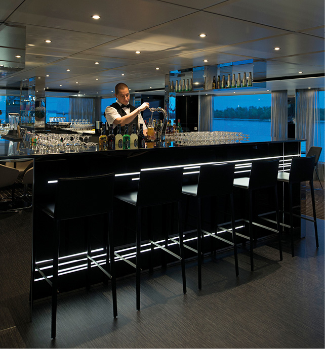 bartender at a bar on a luxury river cruise ship