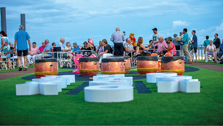 Group of people on the top deck of a river cruise