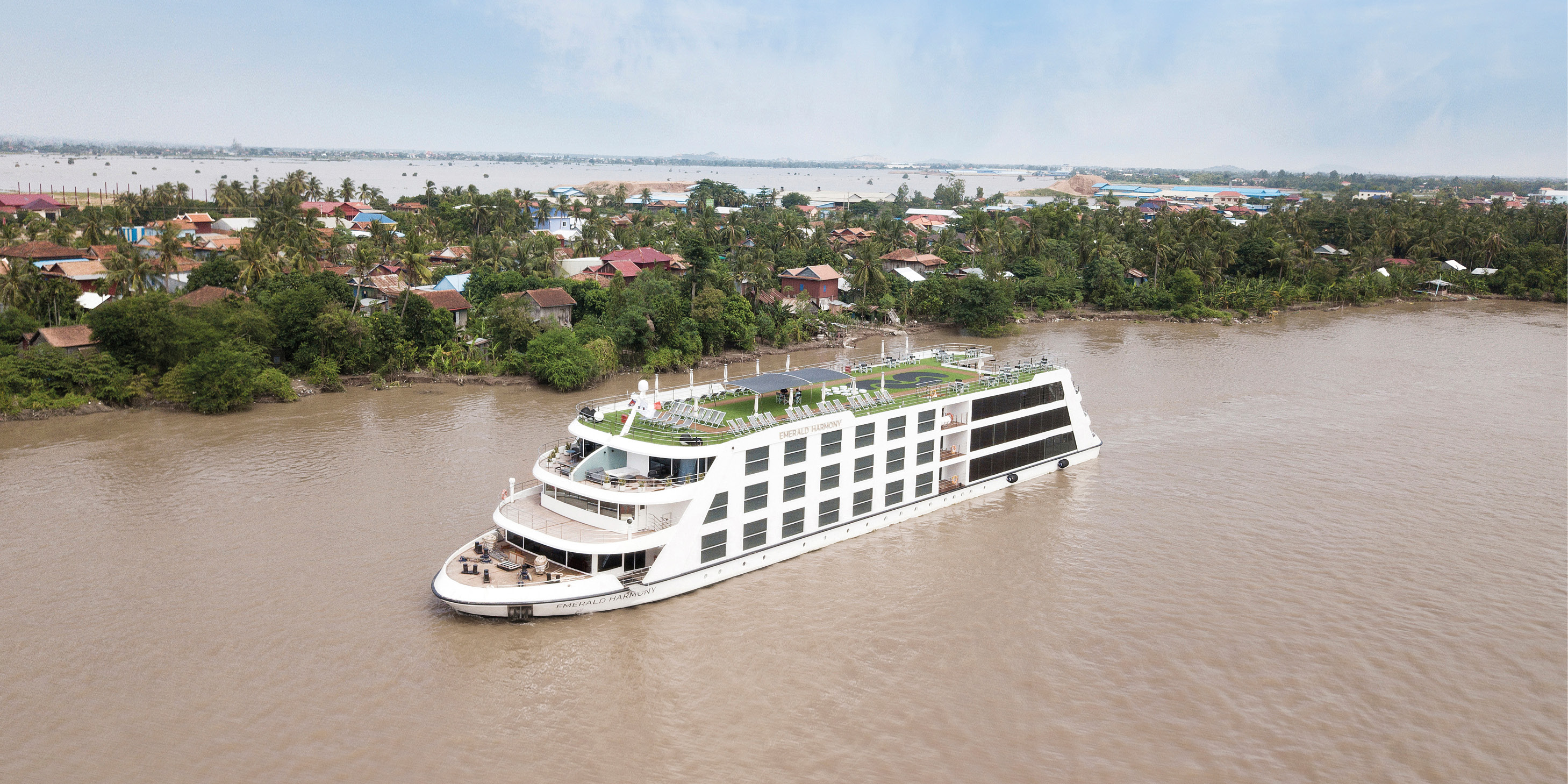 Luxury river ship sailing the Mekong River in Southeast Asia 