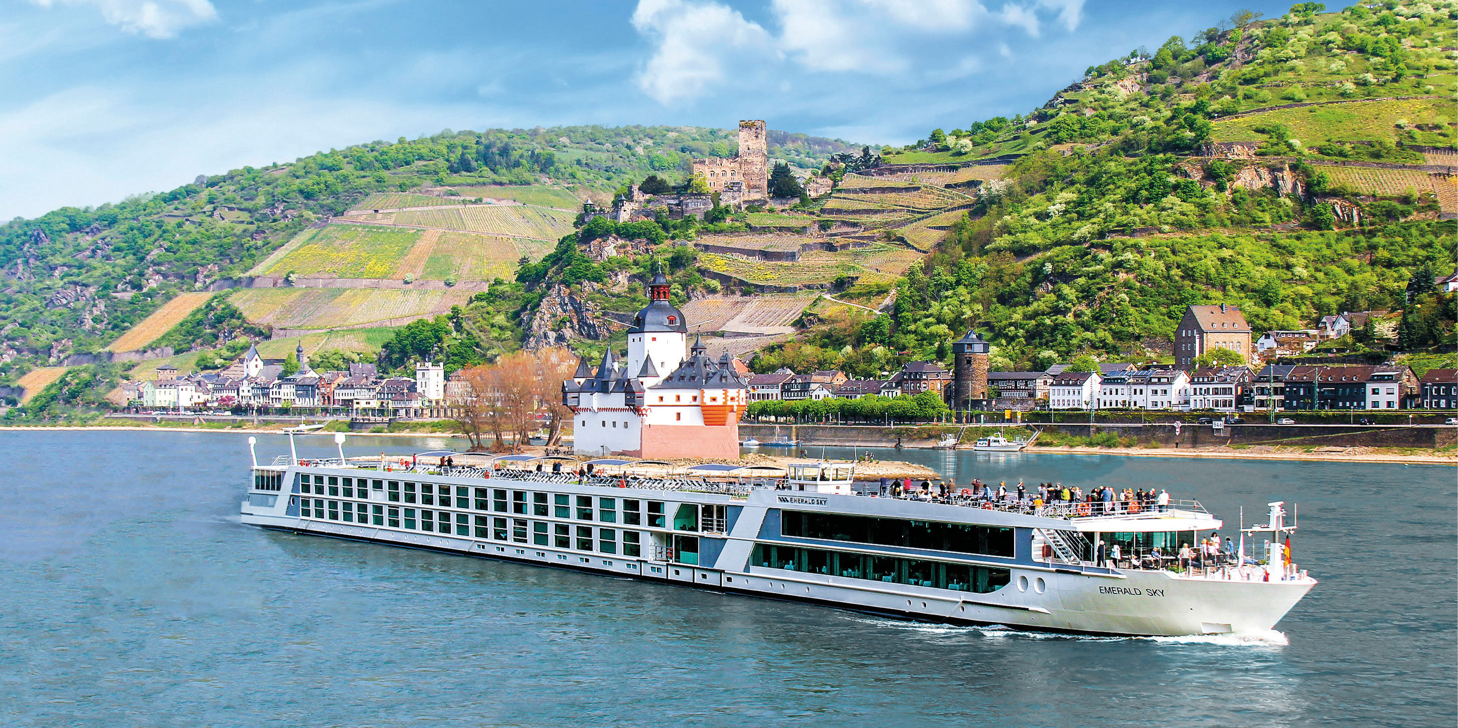  Luxury river ship sailing down the Rhine River   Title: Navigating the rivers of Europe 