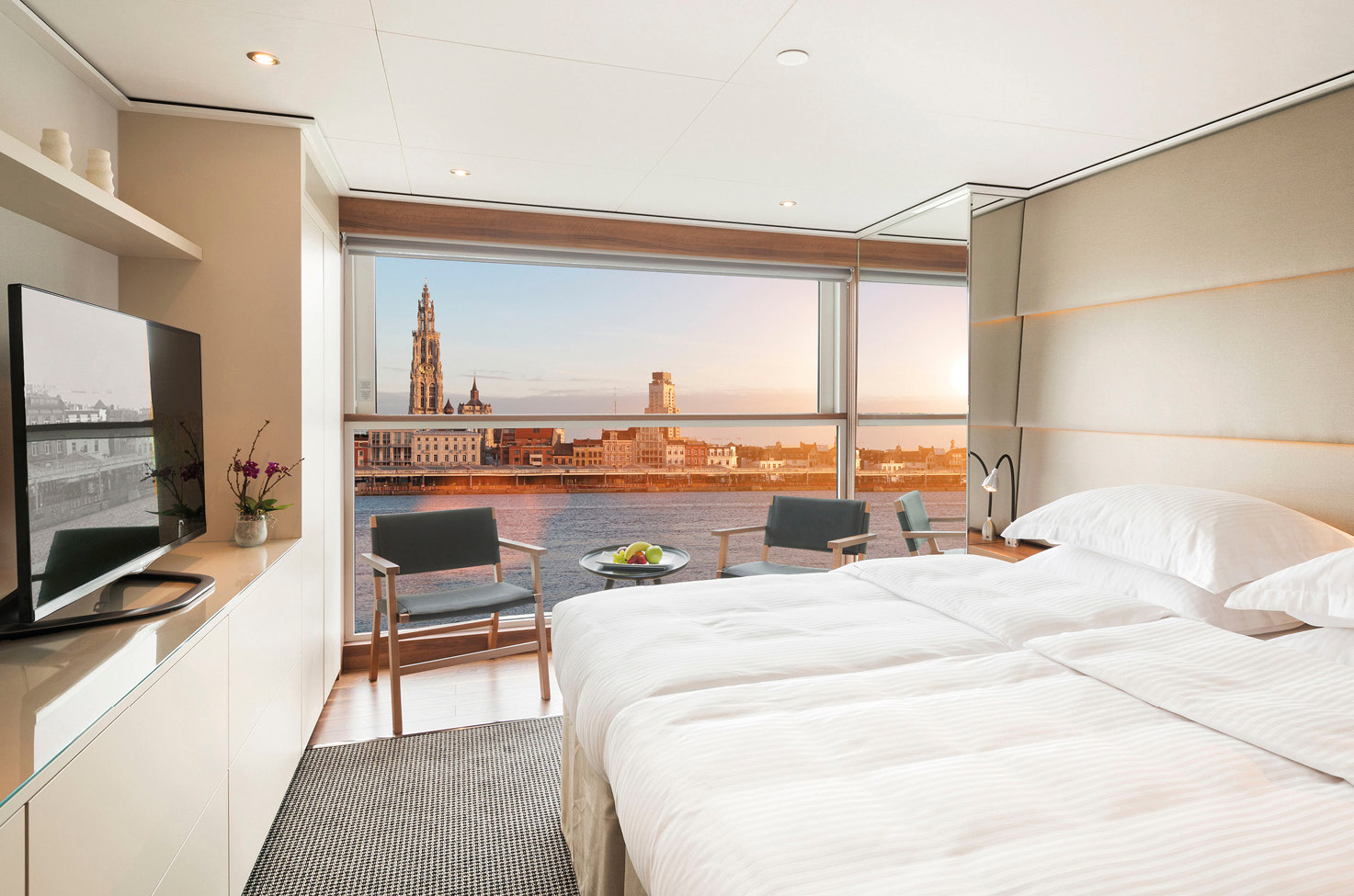 Spacious balcony suite on board a luxury river ship