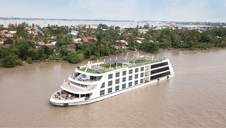 Luxury river ship sailing the Mekong River in Southeast Asia 