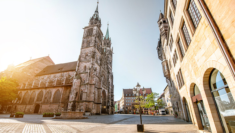 A church and buildings in the streets of Nuremberg