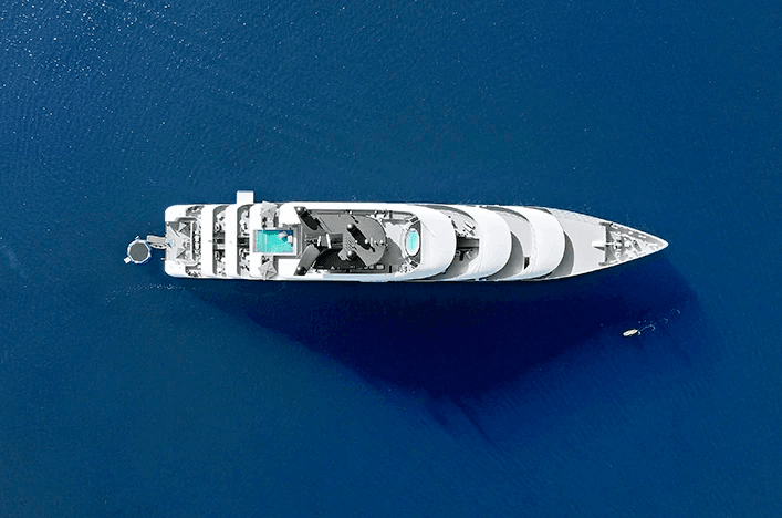 Birdseye view of a luxury yacht sailing the oceans